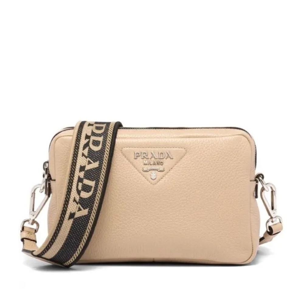 Prada Cream Crossbody Bag with two straps.
